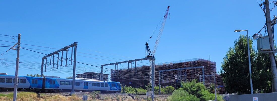 train in front of construction site